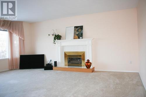 2382 Tamerac Terrace, South Shuswap, BC - Indoor Photo Showing Living Room With Fireplace