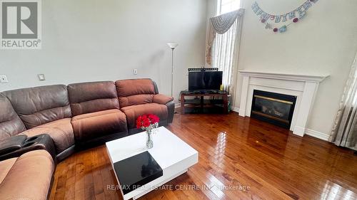 Upper - 56 Southlake Boulevard, Brampton, ON - Indoor Photo Showing Living Room With Fireplace