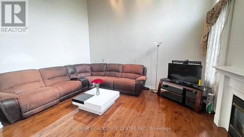 Upper - 56 Southlake Boulevard, Brampton, ON - Indoor Photo Showing Living Room With Fireplace