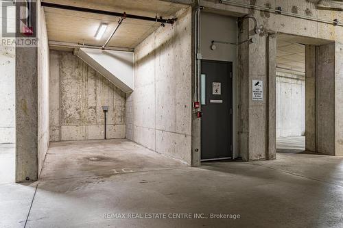 208 - 455 Charlton Avenue E, Hamilton, ON - Indoor Photo Showing Garage