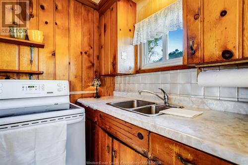 1620 Tilton Line, Wheatley, ON - Indoor Photo Showing Kitchen With Double Sink