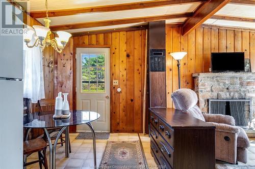 1620 Tilton Line, Wheatley, ON - Indoor Photo Showing Dining Room With Fireplace