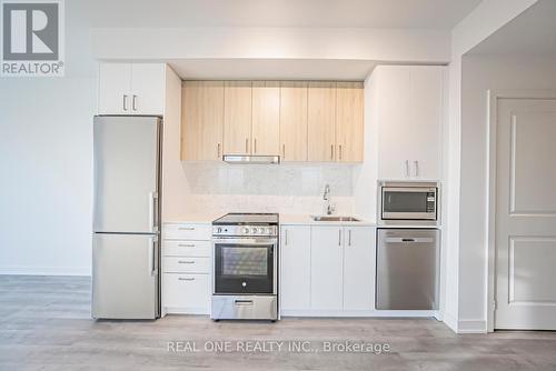 A1602 - 30 Upper Mall Way, Vaughan, ON - Indoor Photo Showing Kitchen With Stainless Steel Kitchen