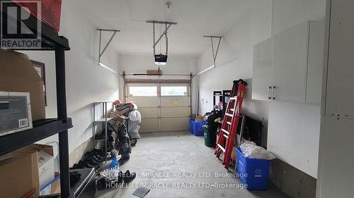 1319 Chee Chee Landing, Milton, ON - Indoor Photo Showing Garage