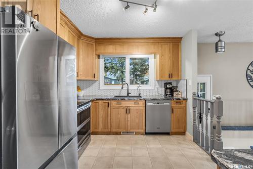 8917 17Th Avenue, North Battleford, SK - Indoor Photo Showing Kitchen With Stainless Steel Kitchen With Double Sink