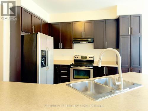 1124 Solomon Court, Milton, ON - Indoor Photo Showing Kitchen With Double Sink