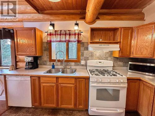 7895 Dean Road, Bridge Lake, BC - Indoor Photo Showing Kitchen With Double Sink