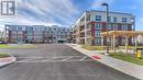 402 - 1975 Fountain Grass Drive, London, ON  - Outdoor With Balcony With Facade 