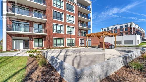 402 - 1975 Fountain Grass Drive, London, ON - Outdoor With Balcony With Facade