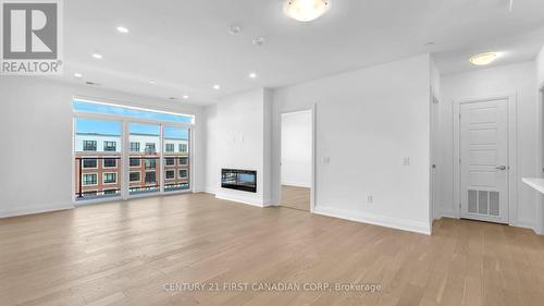 402 - 1975 Fountain Grass Drive, London, ON - Indoor Photo Showing Other Room With Fireplace