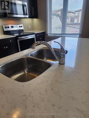 9 - 1960 Dalmagarry Road, London, ON - Indoor Photo Showing Kitchen With Double Sink