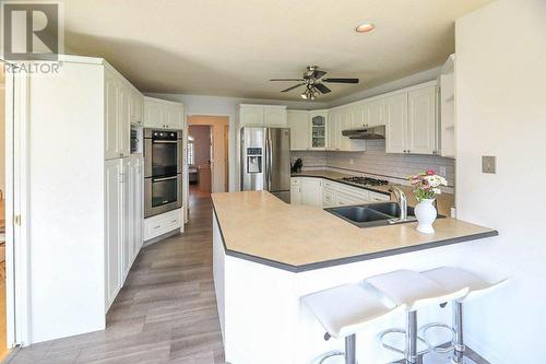 14487 Sutherland Place, Summerland, BC - Indoor Photo Showing Kitchen With Stainless Steel Kitchen With Double Sink