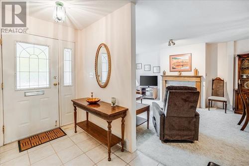 825 Merrycreek Road Unit# 111, Castlegar, BC - Indoor Photo Showing Other Room With Fireplace