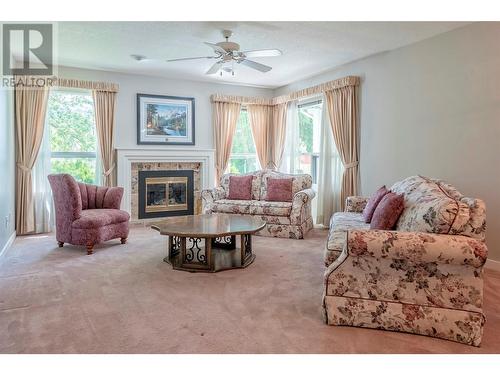 1108 14 Avenue Unit# 134, Vernon, BC - Indoor Photo Showing Living Room With Fireplace