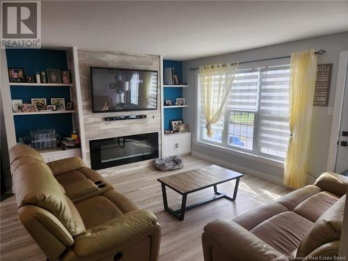 34 Arlequin, Saint-Marie-Saint-Raphaël, NB - Indoor Photo Showing Living Room With Fireplace