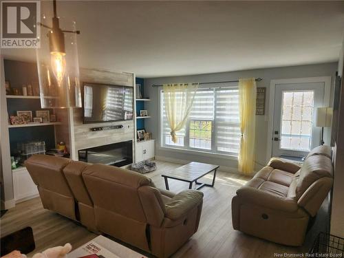 34 Arlequin, Saint-Marie-Saint-Raphaël, NB - Indoor Photo Showing Living Room With Fireplace