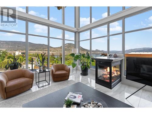 250 Marina Way Unit# 701, Penticton, BC - Indoor Photo Showing Living Room With Fireplace