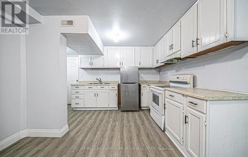 410 Carnwith Drive E, Whitby (Brooklin), ON - Indoor Photo Showing Kitchen With Double Sink