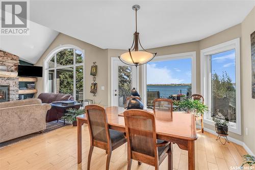 21 Mccrimmon Crescent, Blackstrap Shields, SK - Indoor Photo Showing Dining Room With Fireplace