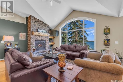 21 Mccrimmon Crescent, Blackstrap Shields, SK - Indoor Photo Showing Living Room With Fireplace