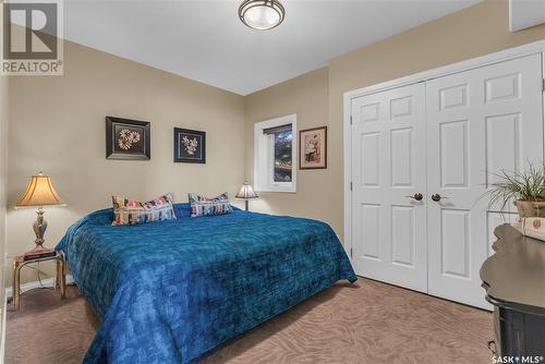 21 Mccrimmon Crescent, Blackstrap Shields, SK - Indoor Photo Showing Bedroom