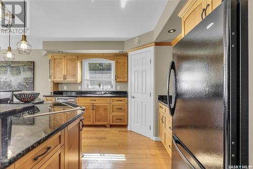 21 Mccrimmon Crescent, Blackstrap Shields, SK - Indoor Photo Showing Kitchen With Double Sink