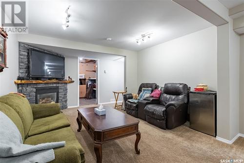 515 6Th Street N, Martensville, SK - Indoor Photo Showing Living Room With Fireplace