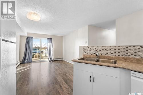 111 303 Lowe Road, Saskatoon, SK - Indoor Photo Showing Kitchen With Double Sink