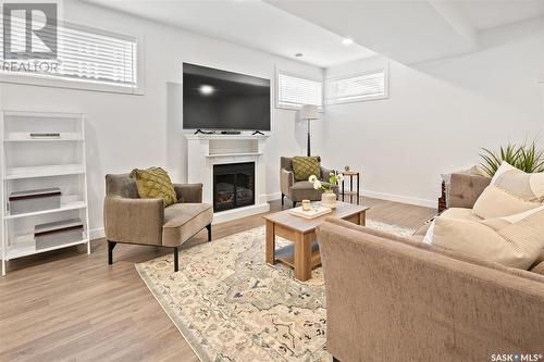 1423 Spadina Crescent E, Saskatoon, SK - Indoor Photo Showing Living Room With Fireplace