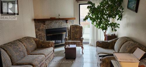 50 Mcinnes Crescent, Toronto, ON - Indoor Photo Showing Living Room With Fireplace