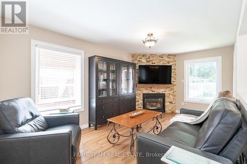 104 Madelaine Drive, Barrie, ON - Indoor Photo Showing Living Room With Fireplace