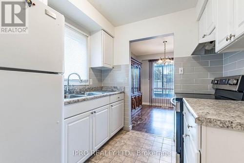 7734 Benavon Road, Mississauga, ON - Indoor Photo Showing Kitchen With Double Sink