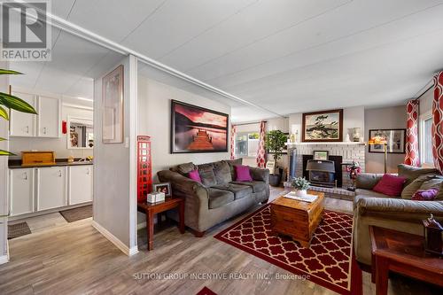 15 Maple Court, Innisfil, ON - Indoor Photo Showing Living Room With Fireplace