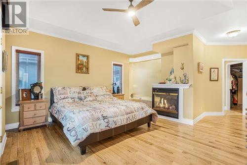 Primary with Fireplace - 338 Belle Rive Street, Hawkesbury, ON - Indoor Photo Showing Bedroom With Fireplace