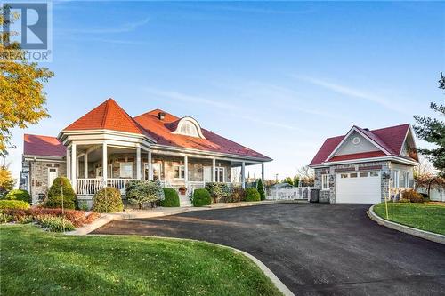 Detch heated garage - 338 Belle Rive Street, Hawkesbury, ON - Outdoor With Deck Patio Veranda With Facade