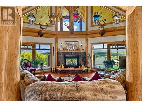 1414 Huckleberry Drive, South Shuswap, BC - Indoor Photo Showing Living Room With Fireplace