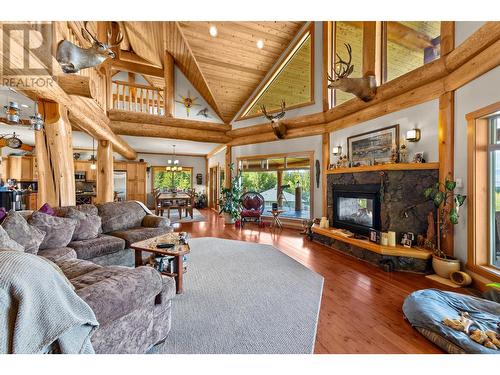 1414 Huckleberry Drive, South Shuswap, BC - Indoor Photo Showing Living Room With Fireplace