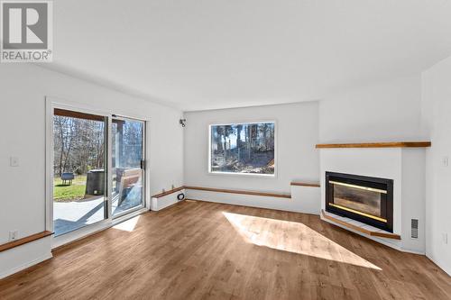 412 Sumac Road, South Shuswap, BC - Indoor Photo Showing Living Room With Fireplace