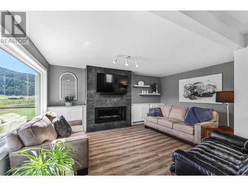 8661 Skimikin Road, Chase, BC - Indoor Photo Showing Living Room With Fireplace