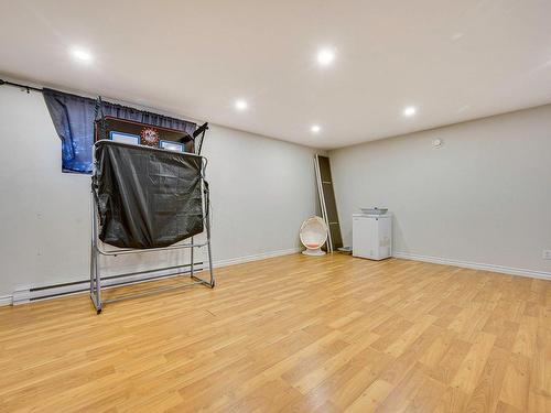 Family room - 13115 Rue Du Maquignon, Mirabel, QC - Indoor Photo Showing Basement