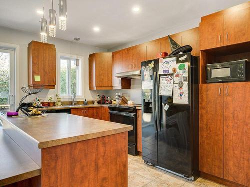 Kitchen - 13115 Rue Du Maquignon, Mirabel, QC - Indoor Photo Showing Kitchen With Double Sink