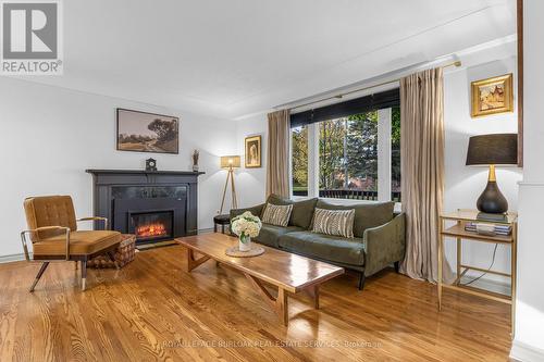 8 Desjardins Avenue, Hamilton, ON - Indoor Photo Showing Living Room With Fireplace