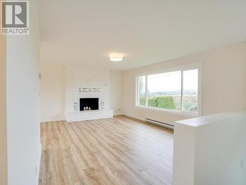 7358 Field Street, Powell River, BC - Indoor Photo Showing Living Room With Fireplace