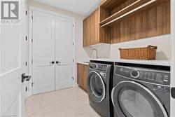 Main Floor Mudroom w/Garage entry, Laundry and sink - 