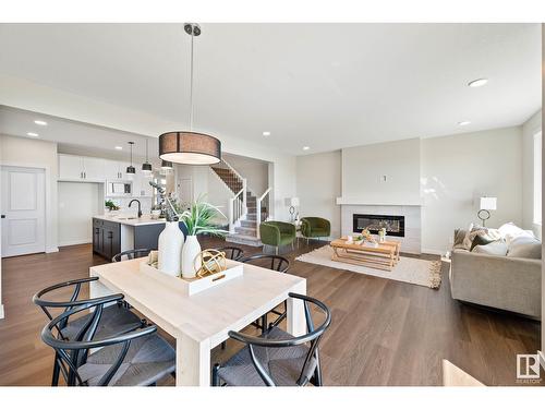 17355 2 St Nw, Edmonton, AB - Indoor Photo Showing Living Room With Fireplace