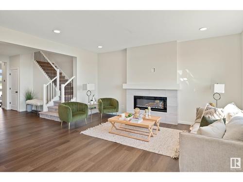 17355 2 St Nw, Edmonton, AB - Indoor Photo Showing Living Room With Fireplace