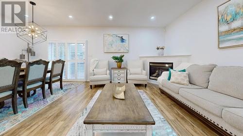 409 Georgian Drive, Barrie, ON - Indoor Photo Showing Living Room With Fireplace