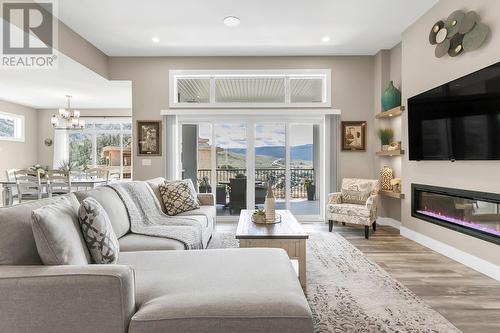 1077 Loseth Drive, Kelowna, BC - Indoor Photo Showing Living Room With Fireplace