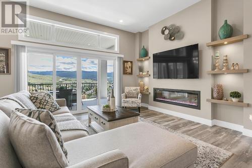 1077 Loseth Drive, Kelowna, BC - Indoor Photo Showing Living Room With Fireplace