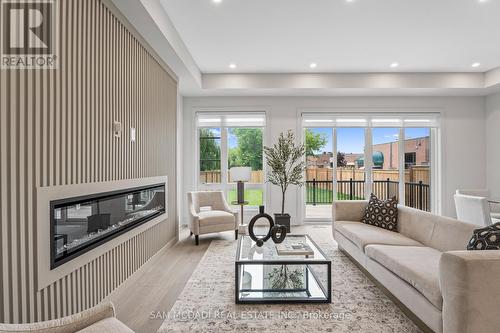 1080 Roosevelt Road, Mississauga, ON - Indoor Photo Showing Living Room With Fireplace